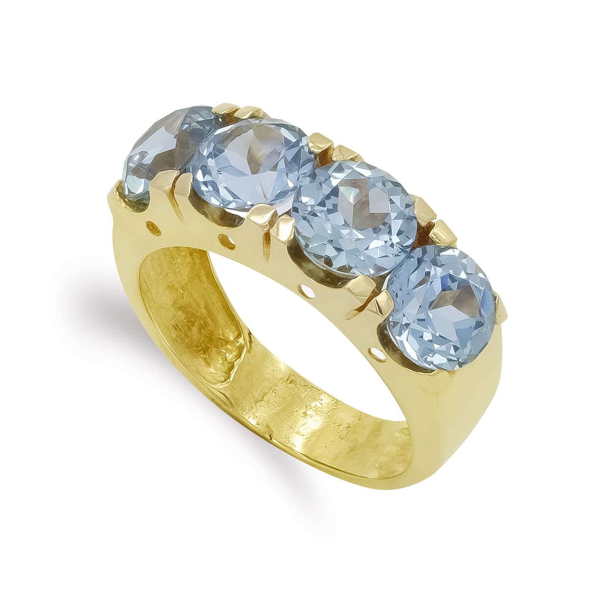Sortija Cuatro Piedras Aguamarina. Ancho: 7 mm de oro amarillo 18K