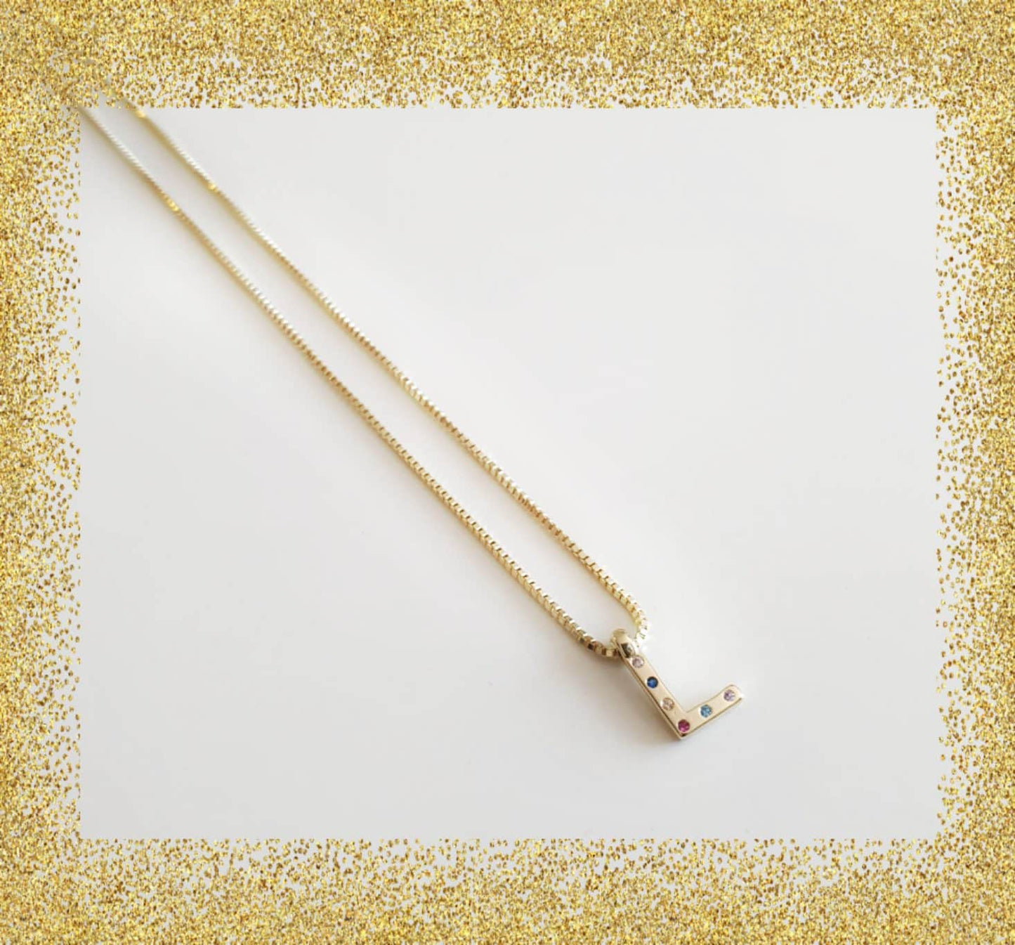 Collar inicial oro l de plata de ley