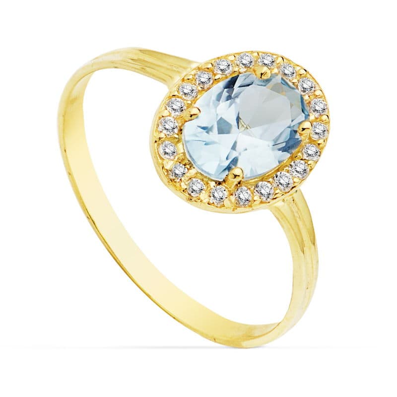 Sortija Circonita Aguamarina Oval 7 x 5 mm. Ancho: 10 mm de oro amarillo 18K