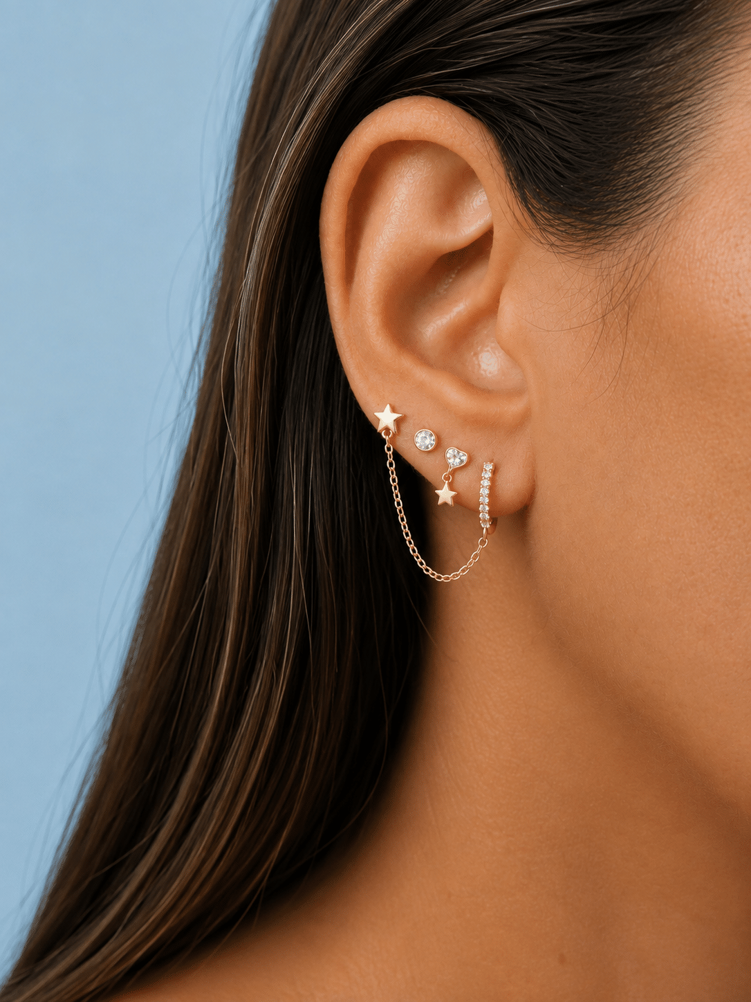 Pendientes cadena estrella de plata de ley con baño de oro de 14 quilates - imagen adicional - Joyería Zafir