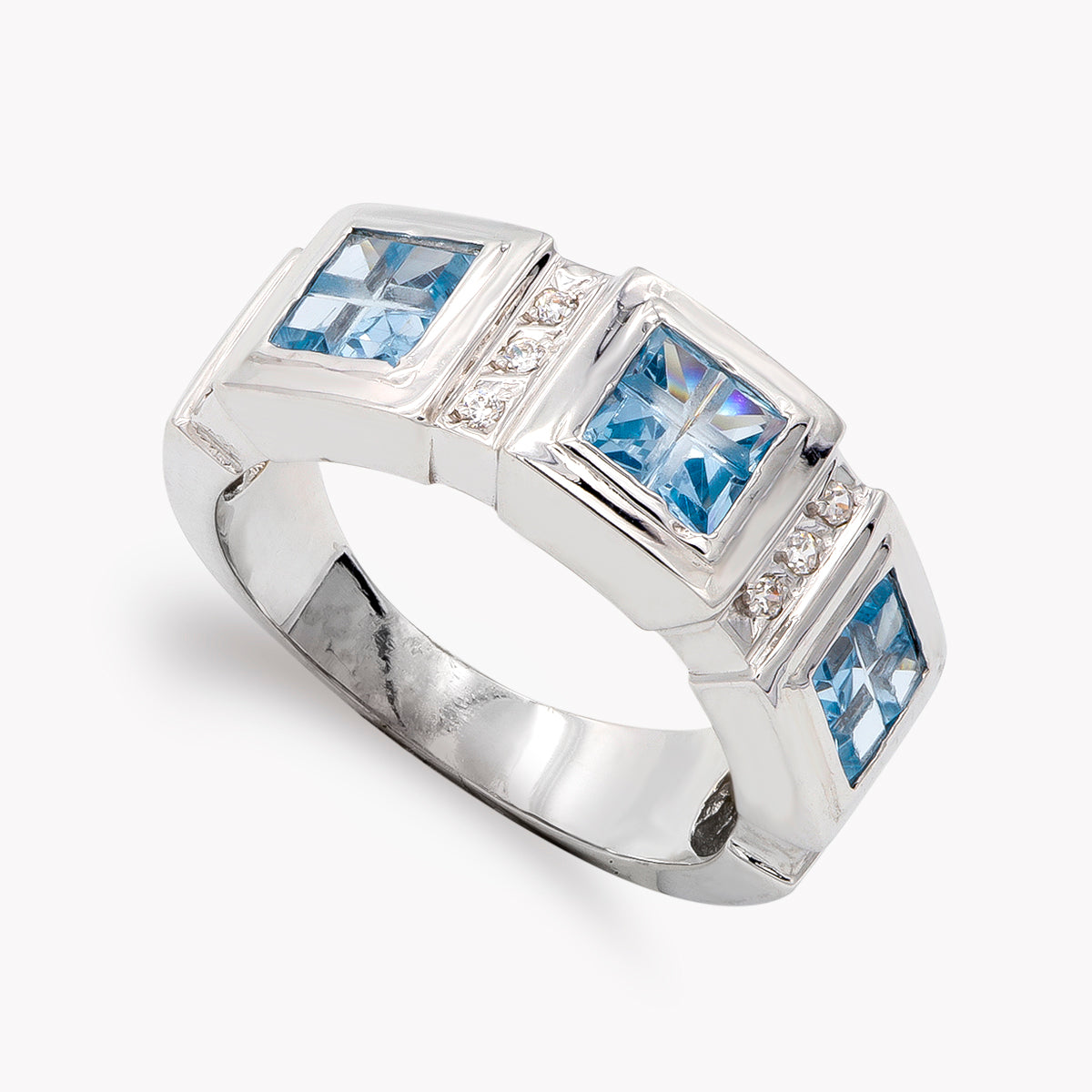 18K SORTIJA ORO BLANCO CON CIRCONITA AGUAMARINA Y BLANCA. ANCHO: 8 MM