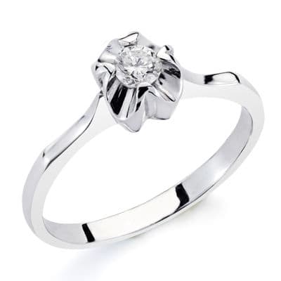 18K SOLITARIO ORO BLANCO DIAMANTE NATURAL TALLA BRILLANTE 0.20 QTS. ANCHO: 6MM.