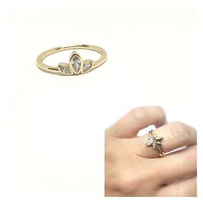 Anillo oro pétalos circonitas de 14 quilates