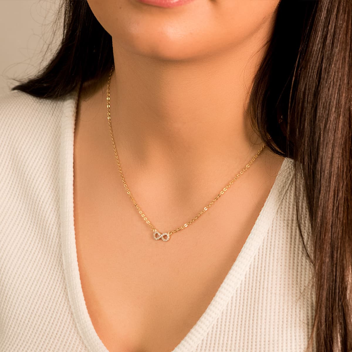 18K COLGANTE ORO BICOLOR INFINITO 12X5 MMCADENA 45CM