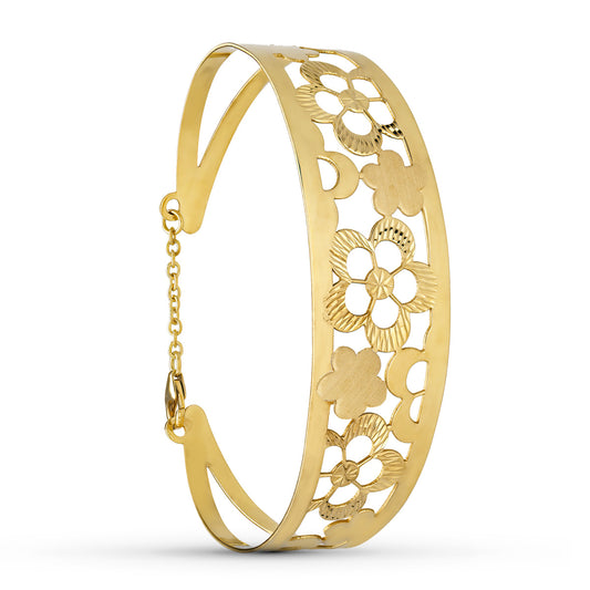 18K PULSERA RIGIDA ORO AMARILLO FLORES MEDIDA INTERIOR 65X55 MM ANCHO TOTAL 20 MM CIERRE MOSQUETON CON CADENA