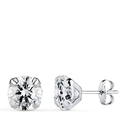 18K PENDIENTES ORO BLANCO CIRCONITA CON 4 GARRAS. MEDIDA: 7 X 7 MM. CIERRE PRESION