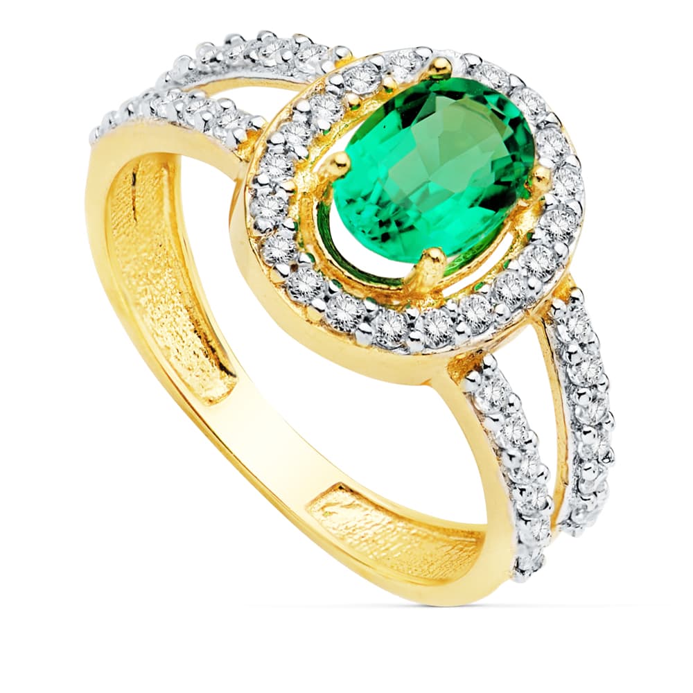 18K SORTIJA ORO BICOLOR CON CIRCONITA Y ESMERALDA 0.79 QTES DE 7X5 MM