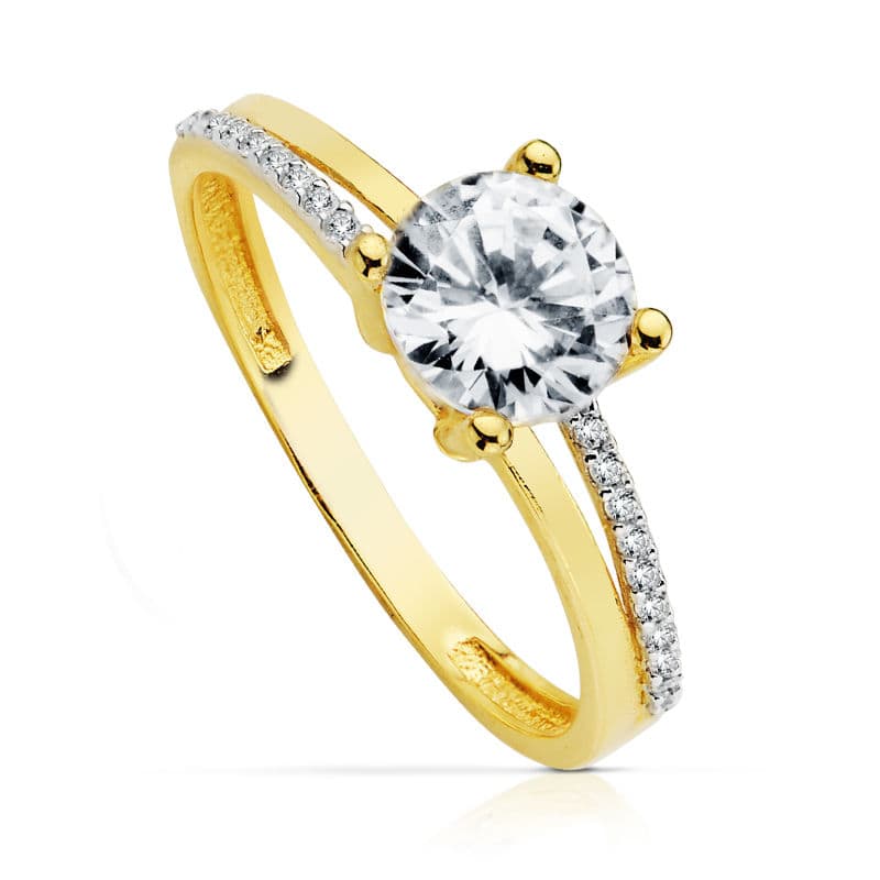 18K SOLITARIO ORO BICOLOR CON CIRCONITA Y 4 GARRAS CON CIRCONITA DE 7 MM
