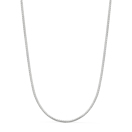 Cadena Plana en Brillo. Ancho: 1,2 mm. Largo: 45 cm. Cierre Reasa de oro blanco 18K