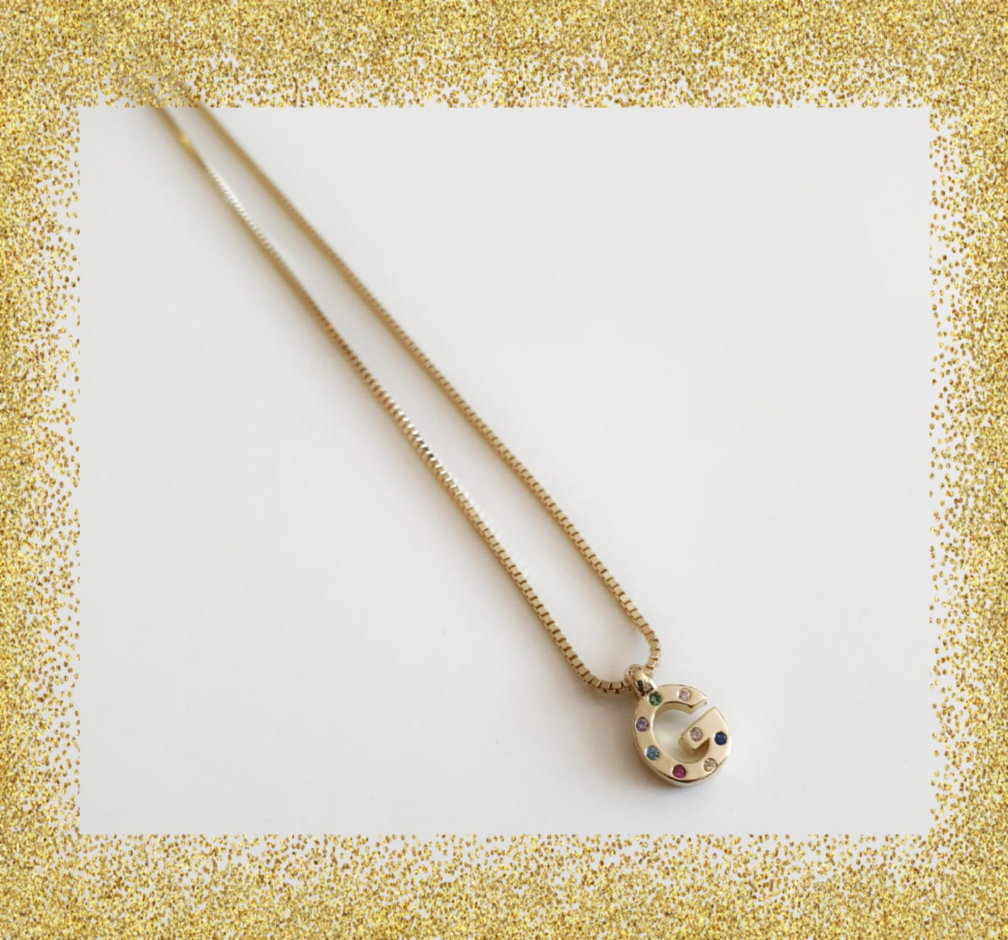 Collar inicial oro g de plata de ley