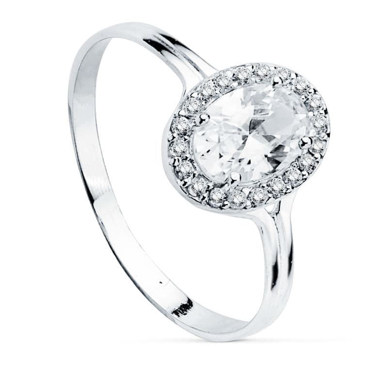 Sortija Motivo Oval con Circonitas. Medida: 10 x 8 mm de oro blanco 18K
