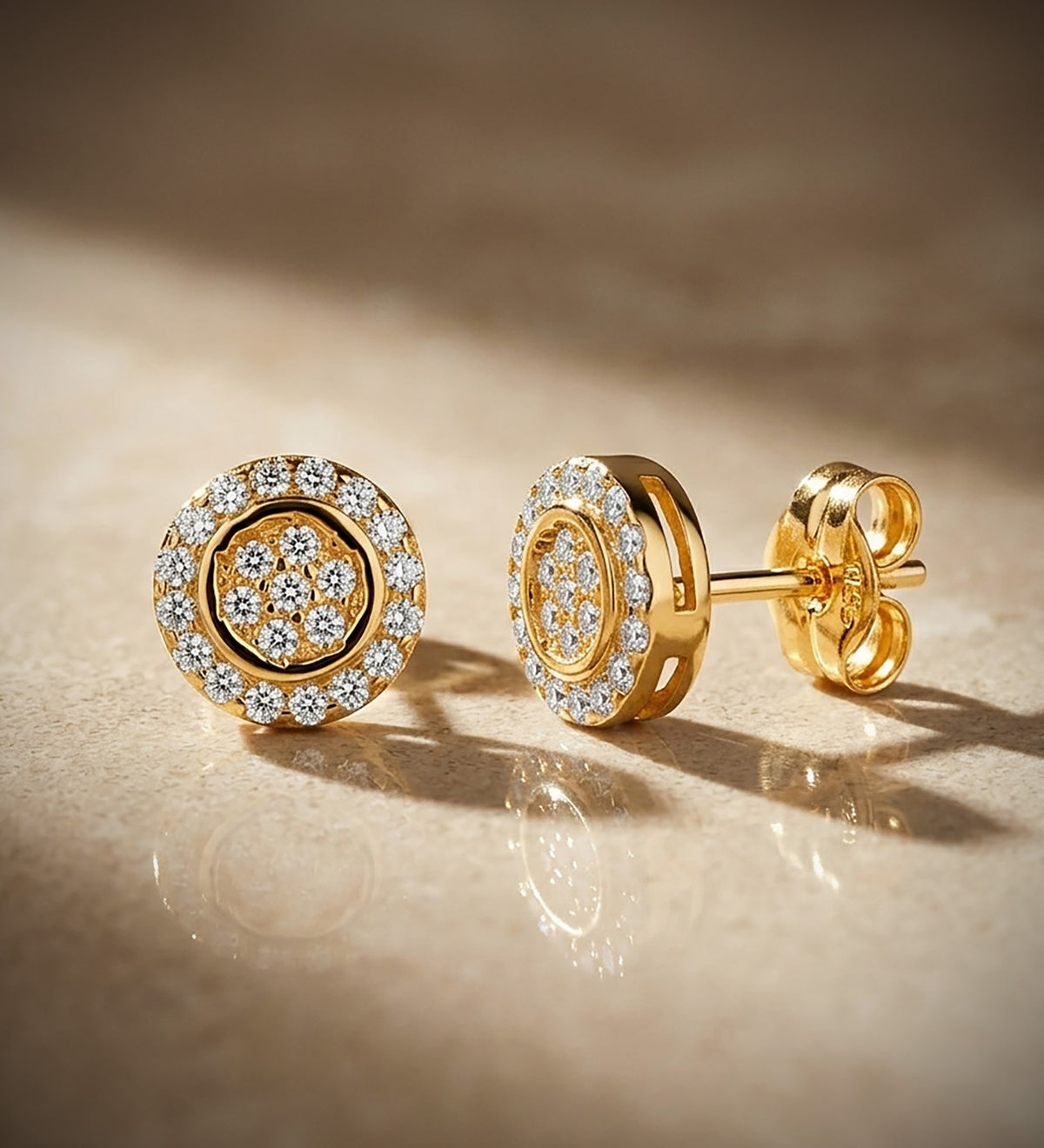 Pendientes Redondos con Circonitas. Medida: 7 mm. de oro amarillo 18K