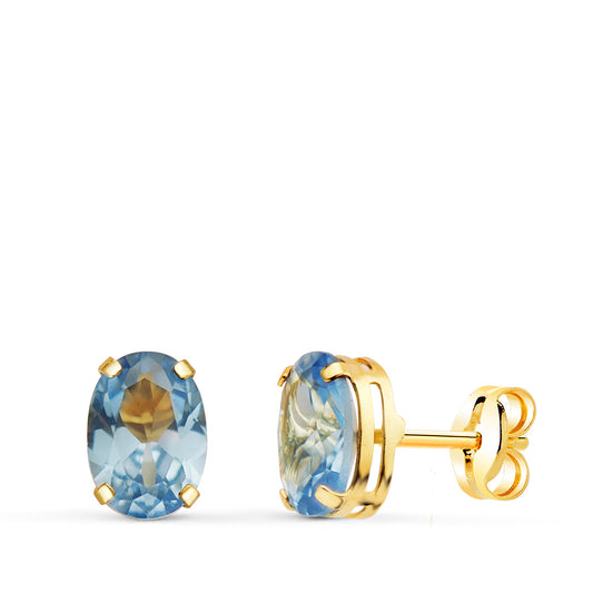 Pendientes Oval Piedra Azul 7 x 5 mm. de oro amarillo 18K
