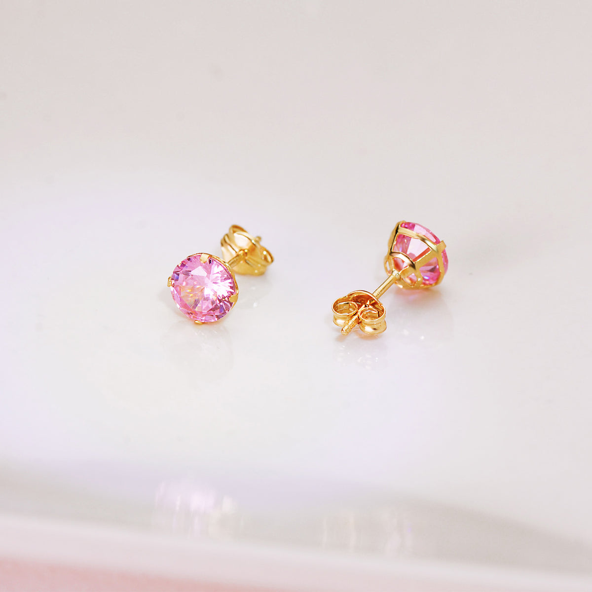 Pendientes Redondos Piedra Rosa 6 mm. de oro amarillo 18K