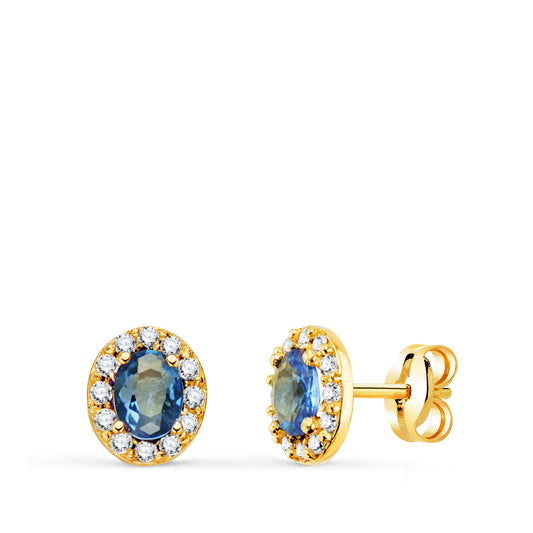 Pendientes Piedra Oval Azul y Circonitas. 6,5 x 5,5 mm. de oro amarillo 18K