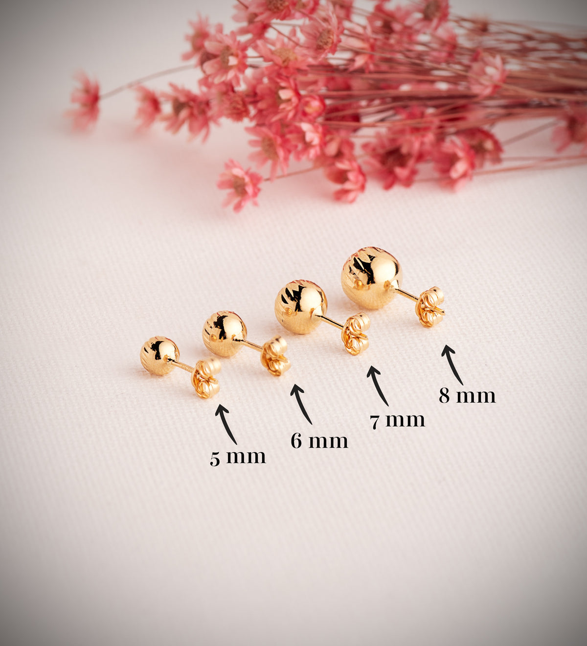 Pendientes Bola Tallada Hueca. Ancho: 7 mm. de oro amarillo 18K