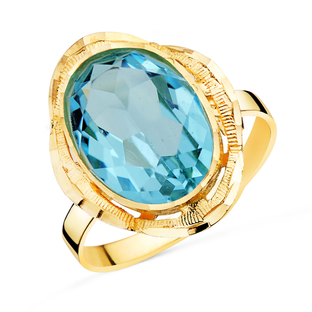 Sortija Aguamarina Oval Cerco Tallado. Medida: 19 x 14 mm de oro amarillo 18K