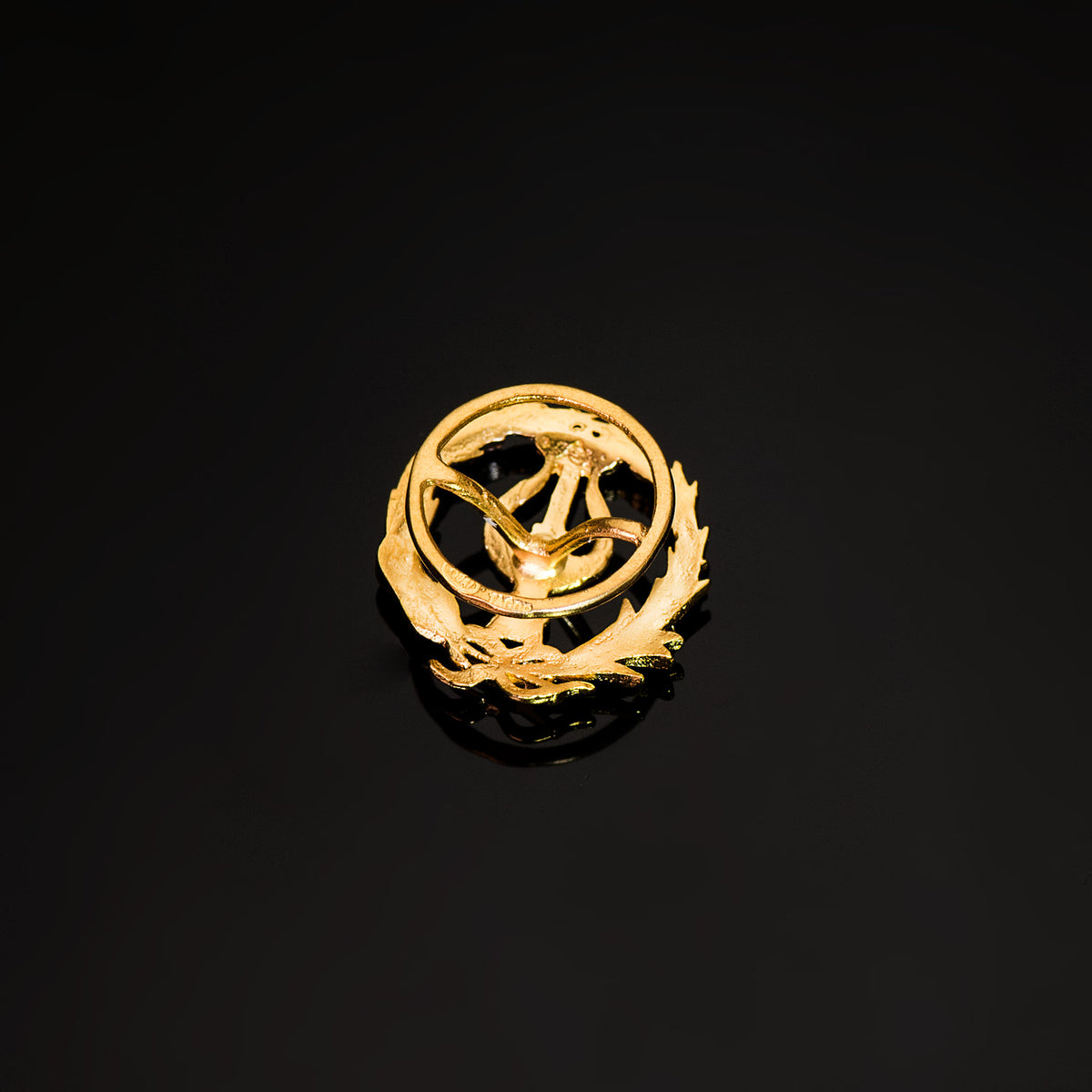Insignia Musico 16 x 14 mm de oro amarillo 18K