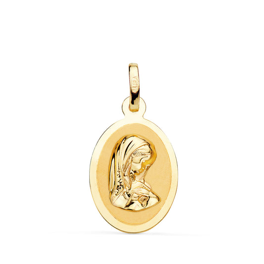 Medalla Virgen Niña en Brillo. Medida: 19 x 12 mm de oro amarillo 18K
