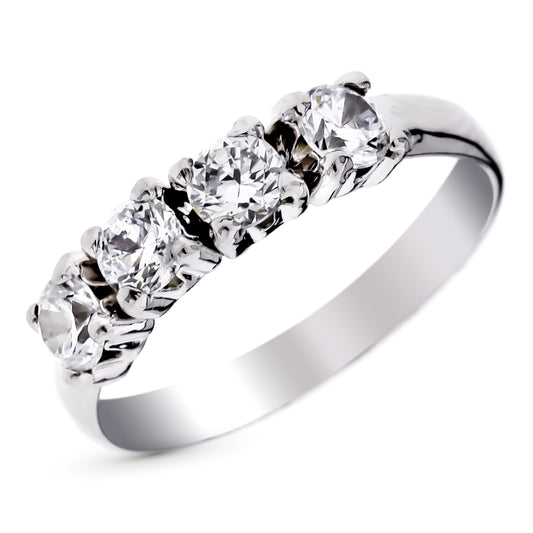 9k SORTIJA ORO BLANCO CON CIRCONITAS EN GARRAS. ANCHO: 4 MM