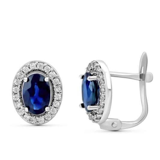 Pendientes Zafiro Natural 6 x 4 mm Total 0,52 Qts. Medida: 10 x 8 mm. de oro blanco 9K