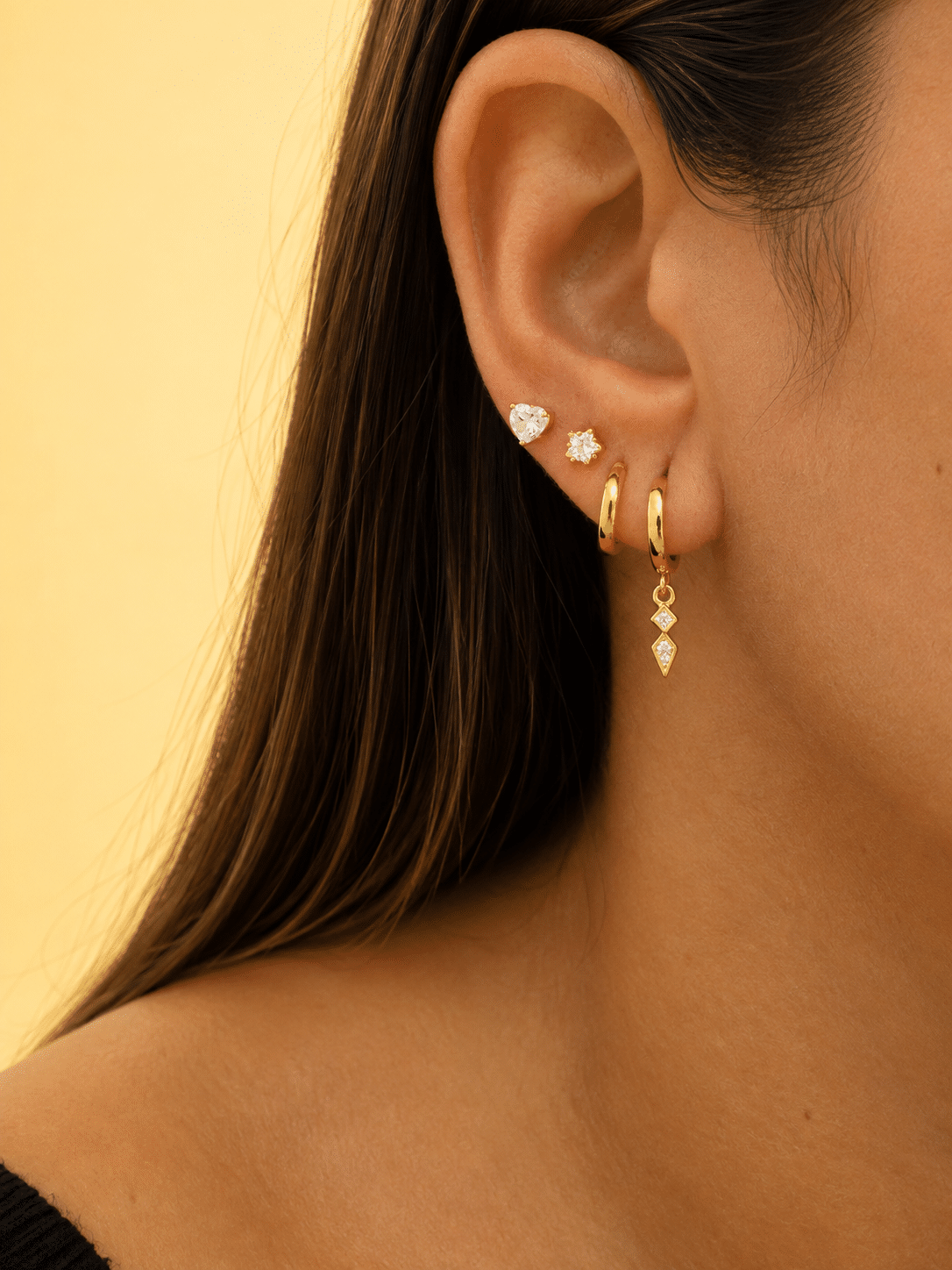 Pendientes Amazona de plata de ley con baño de oro de 14 quilates - imagen adicional - Joyería Zafir