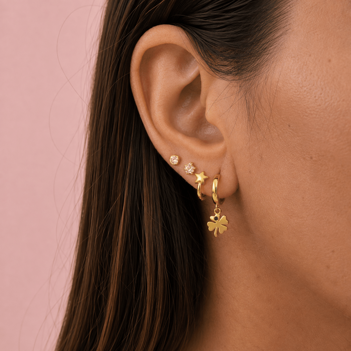 Pendientes aritos estrella de plata de ley con baño de oro de 14 quilates - imagen adicional - Joyería Zafir