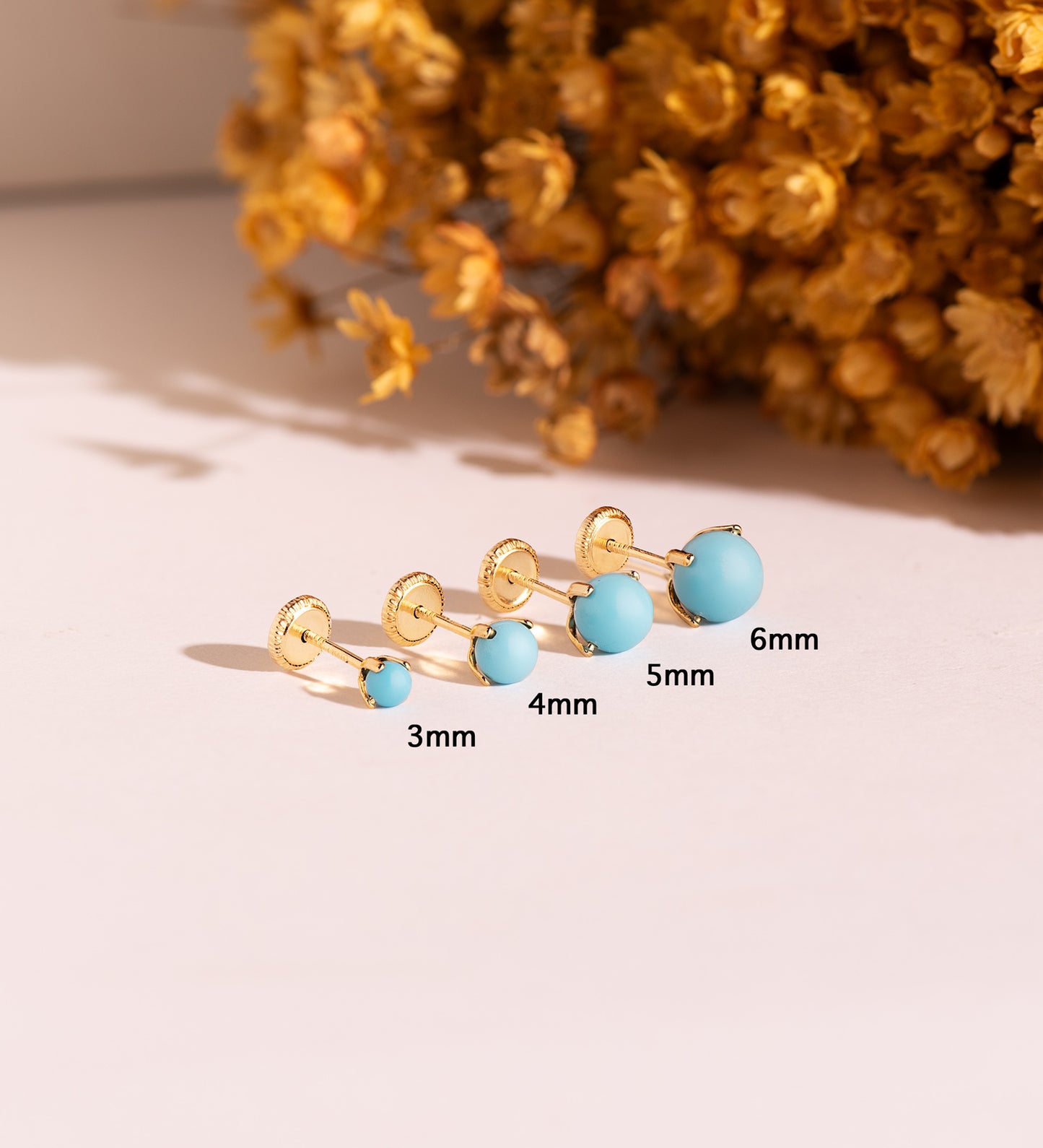 18K PENDIENTES ORO AMARILLO TURQUESA CON 4 GARRAS. MEDIDA: 4 MM. CIERRE TUERCA