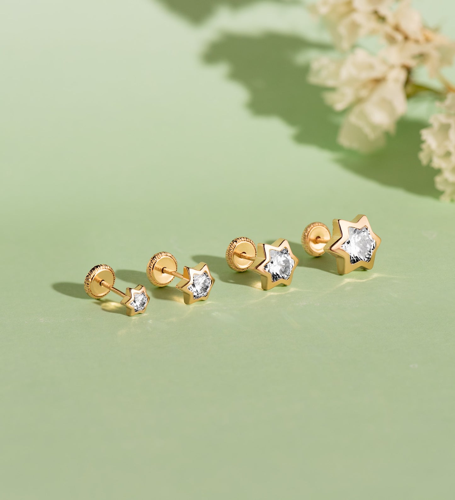 18K PENDIENTES ORO AMARILLO ESTRELLA CON CIRCONITA. MEDIDA: 6X5,5 MM. CIERRE TUERCA