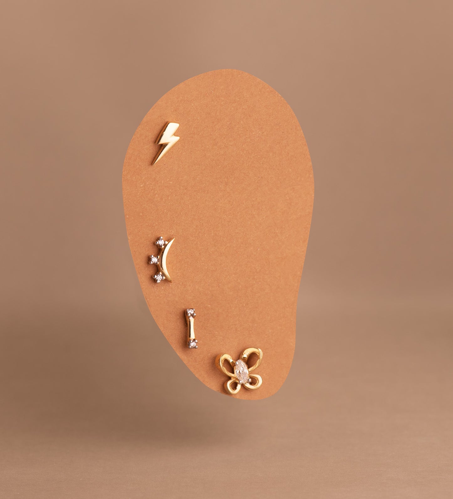 18K PIERCING ORO BICOLOR LUNA CON CIRCONITAS. MEDIDA: 8X4 MM. CIERRE TUERCA