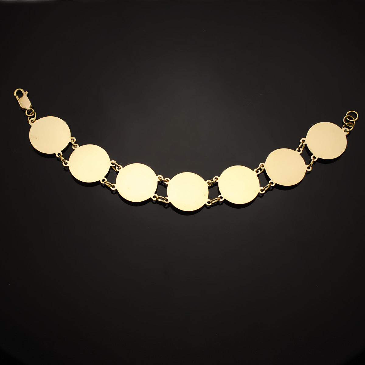 Pulsera con Medusas Redondas en Brillo 20 mm Largo 21,5 cm de oro amarillo 18K