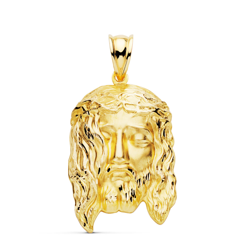 Colgante Cabeza de Cristo Estampado. 30 x 19 mm de oro amarillo 18K