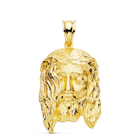 Colgante Cabeza de Cristo Estampado. 30 x 19 mm de oro amarillo 18K