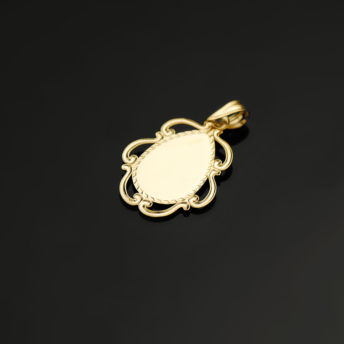 18K MEDALLA ORO AMARILLO VIRGEN NIÑA ESMALTE ROSA Y CERCO CALADO EN BRILLO 22X16 MM