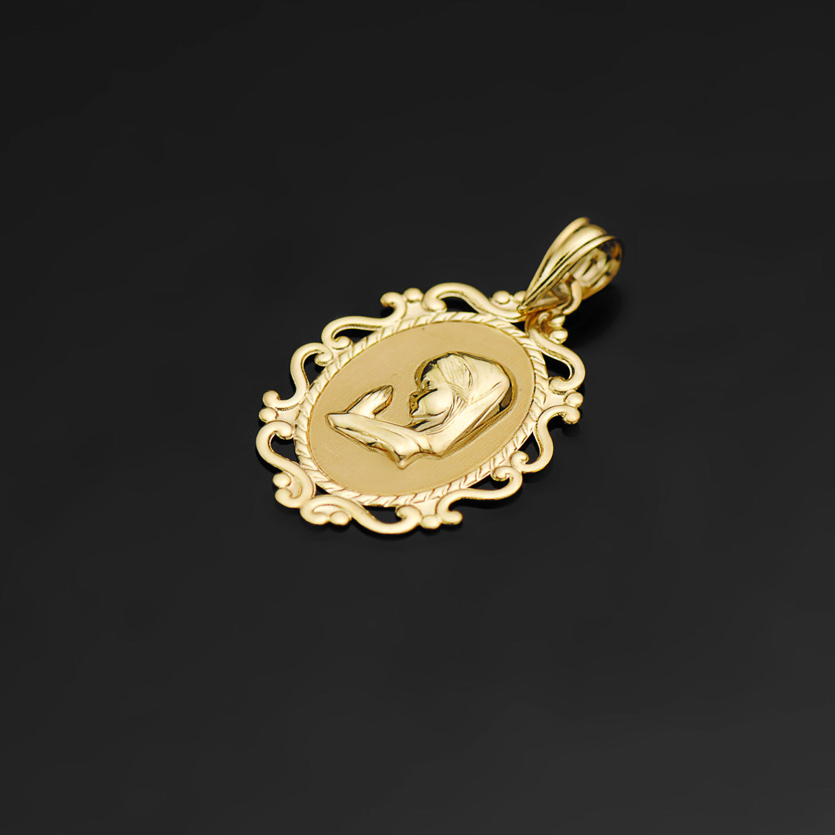 18K MEDALLA ORO AMARILLO VIRGEN NIÑA PERFIL CERCO CALADO BRILLO. 23 X 16 MM