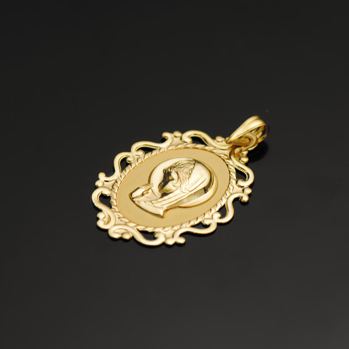 Medalla Virgen Niña Cerco Calado en Brillo 31 x 21 mm de oro amarillo 18K